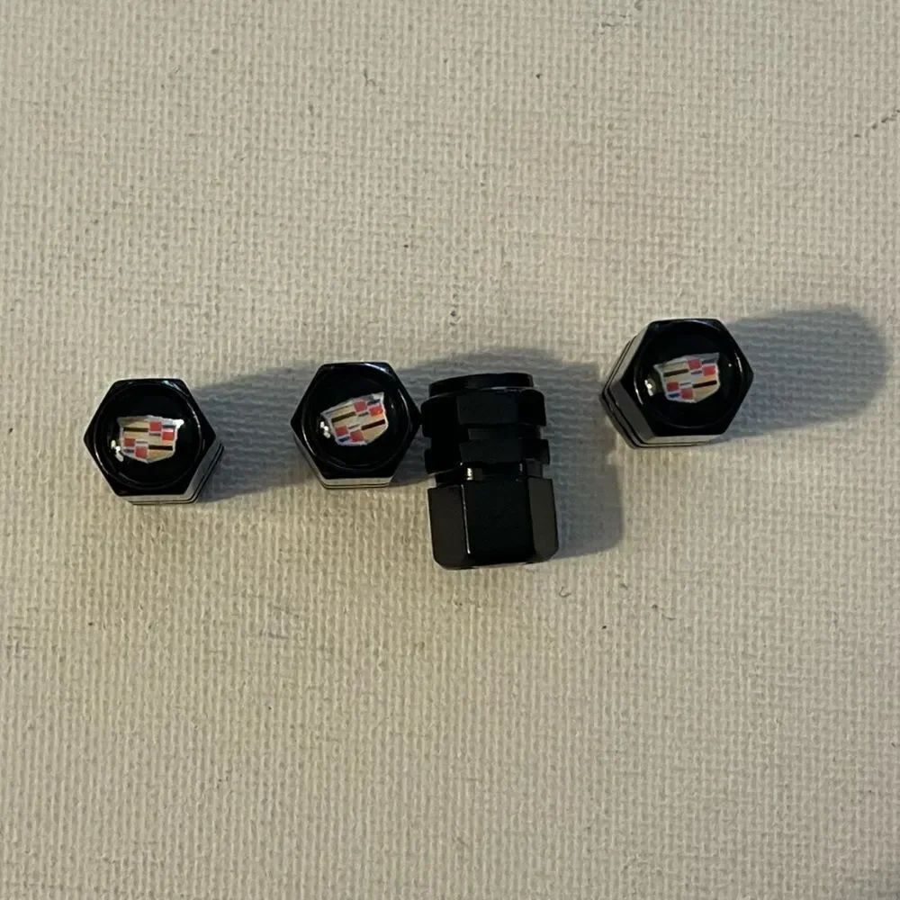 Cadillac Logo Valve Stem Caps in Black set of 4 NWT